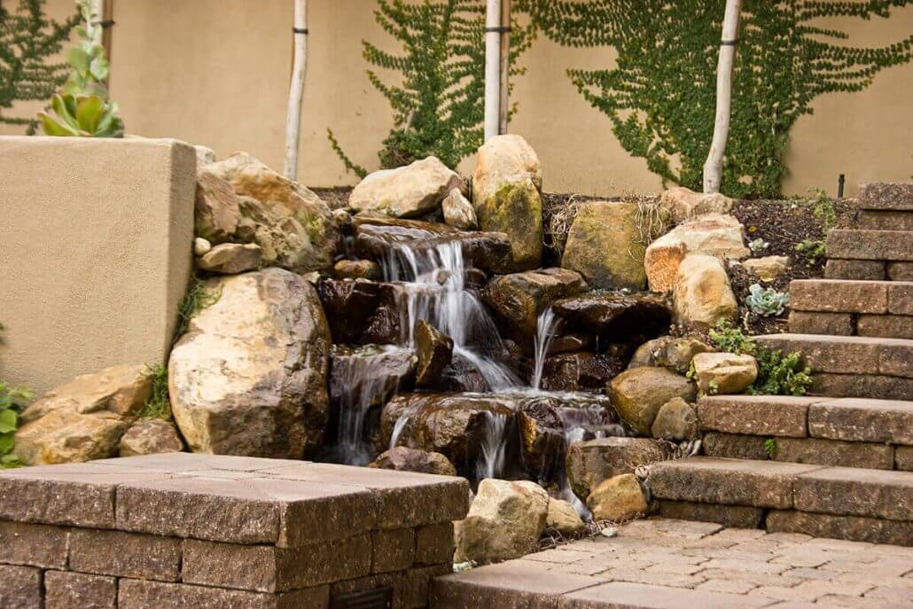 Pondless Waterfall with Paving Stone Stairs and Patio